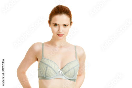 Attractive slim woman in grey matching underwear