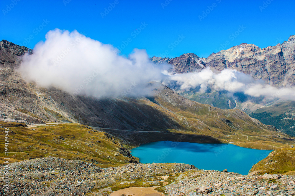 Amazing view on Alps: valley and mountains at summer.