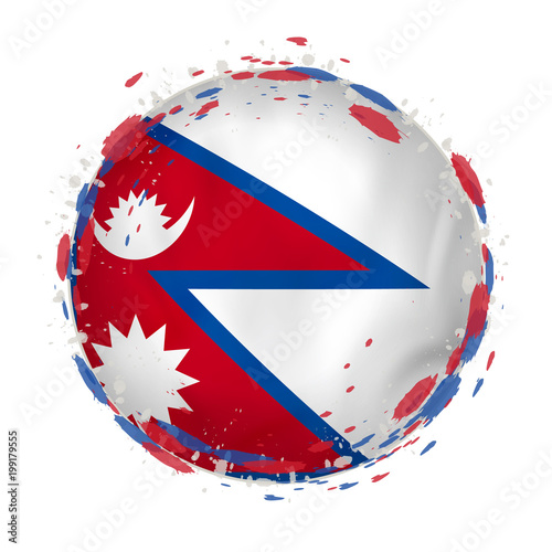 Round grunge flag of Nepal with splashes in flag color.