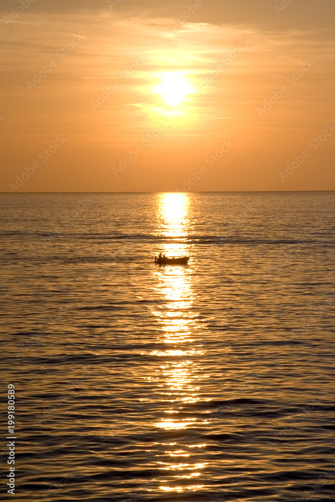 boat at sunset on the Mediterranean sea