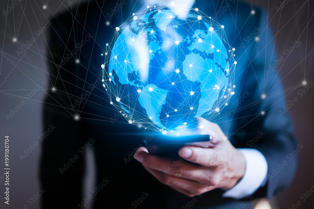 Businessman using smartphones with global network interface. Businessman using smartphones with global network interface.