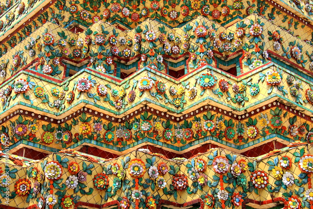 Unique porcelain decor of the ancient Thai Buddhist temple - mosaic and porcelain flowers, Thailand, South East  Asia