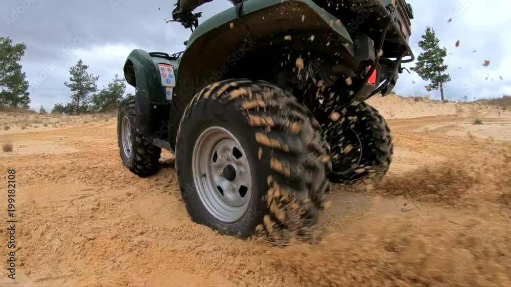 Slow motion shot of quad sand Slow motion shot of quad sand