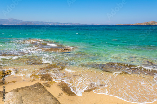 Clear azure sea water of Agia Anna beach. Naxos island. Greece