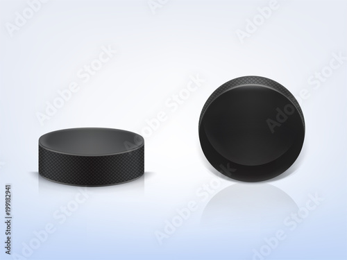 Vector 3d realistic black rubber puck to play ice hockey isolated on light background. Sport equipment, hard round disk, inventory for winter team game on skating rink