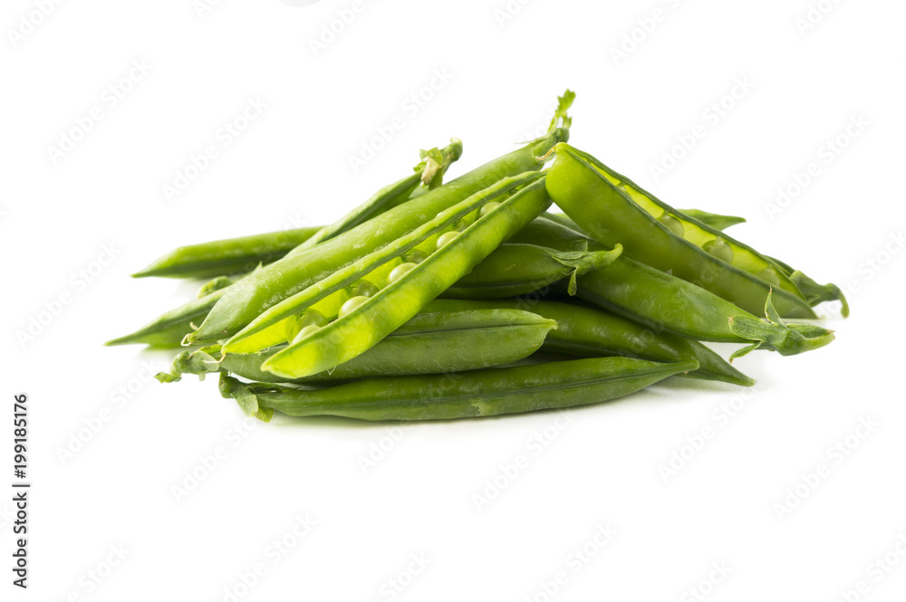 Green peas isolated on a white background. Vegetables with copy space for text. Fresh green peas on a white background. Studio photo. Isolated macro food photo close up from above on white background. Green peas isolated on a white background. Vegetables with copy space for text. Fresh green peas on a white background. Studio photo. Isolated macro food photo close up from above on white background.