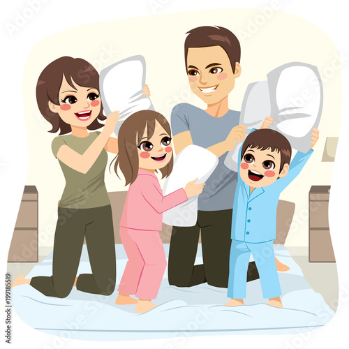 Happy sweet family making pillow fight over bed on bedroom having fun