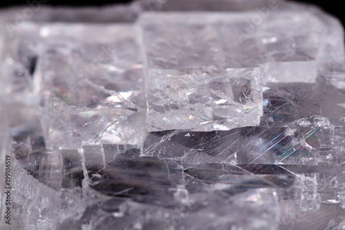 Macro mineral stone Iceland spar on black background photo