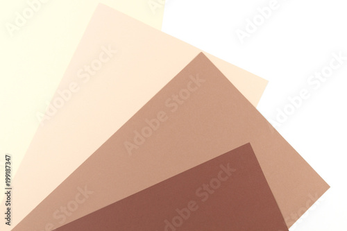 Colorful soft brown, beige, yellow and white paper background.