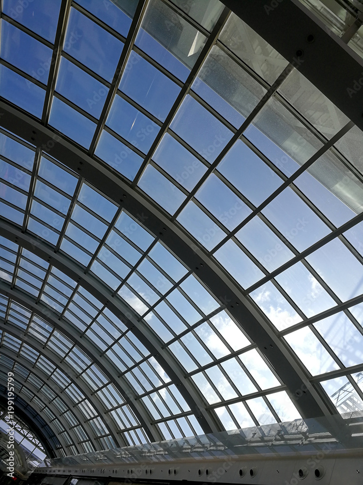 sky and clouds through the glass roof sky and clouds through the glass roof