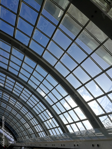 sky and clouds through the glass roof