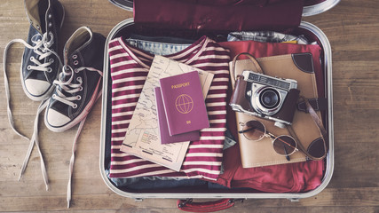Travel suitcase preparing concept 