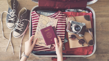 Travel suitcase preparing concept 