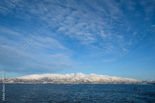 Bright landscapes taken from the waters of the Fjords around Troms    Norway