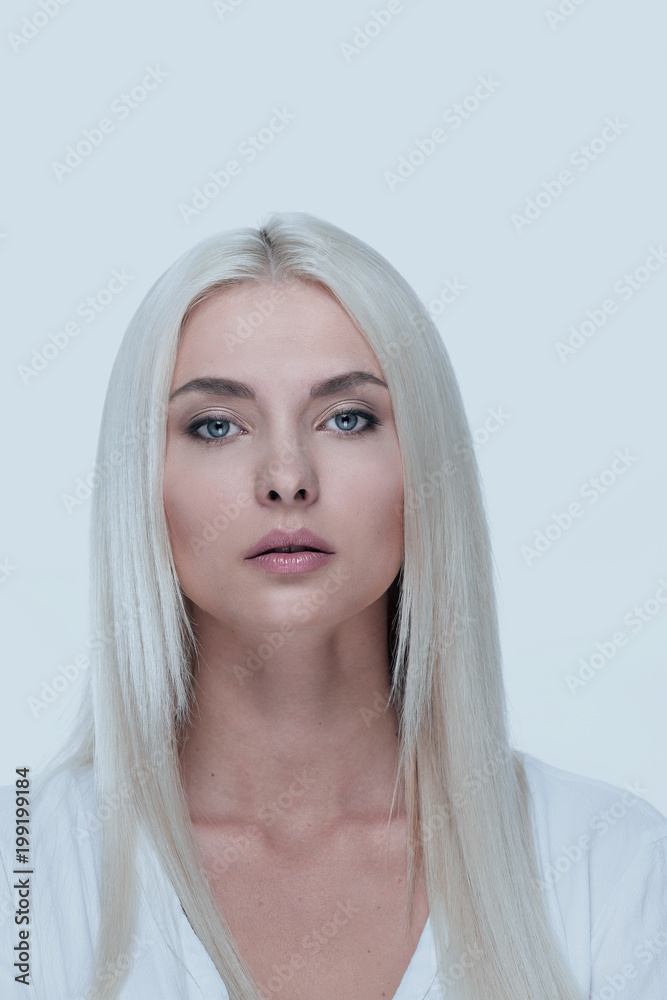 Close-up of a beautiful woman with blonde straight hair and daytime make-up Close-up of a beautiful woman with blonde straight hair and daytime make-up