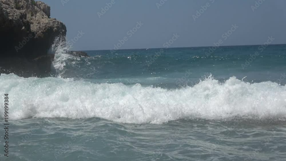 Strong Sea Waves Create White Foam