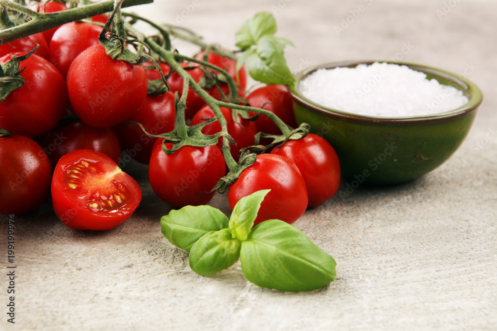 Ripe tasty red tomatoes with salt and basil. Village market organic tomatoes. Fresh tomato Ripe tasty red tomatoes with salt and basil. Village market organic tomatoes. Fresh tomato