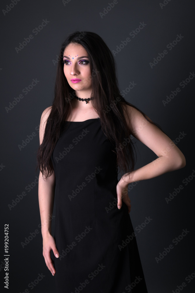 Young arabic woman isolated on gray background Young arabic woman isolated on gray background