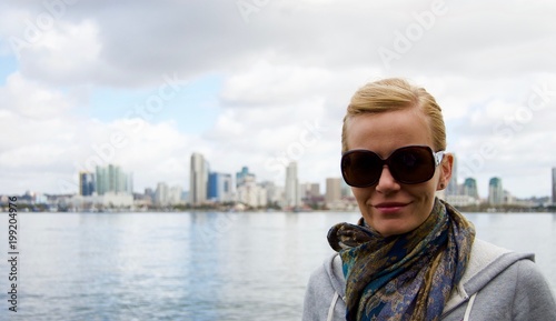 Blonde Woman in front of San Diego Skyline - California, USA © ICW
