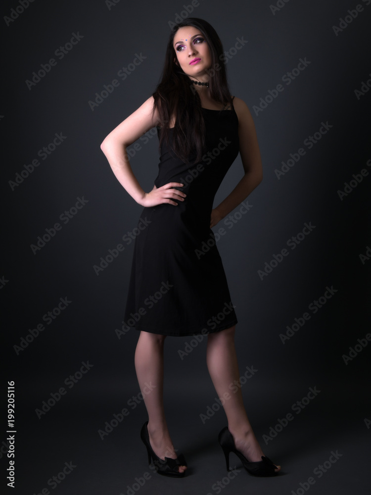 Young arabic woman isolated on gray background Young arabic woman isolated on gray background