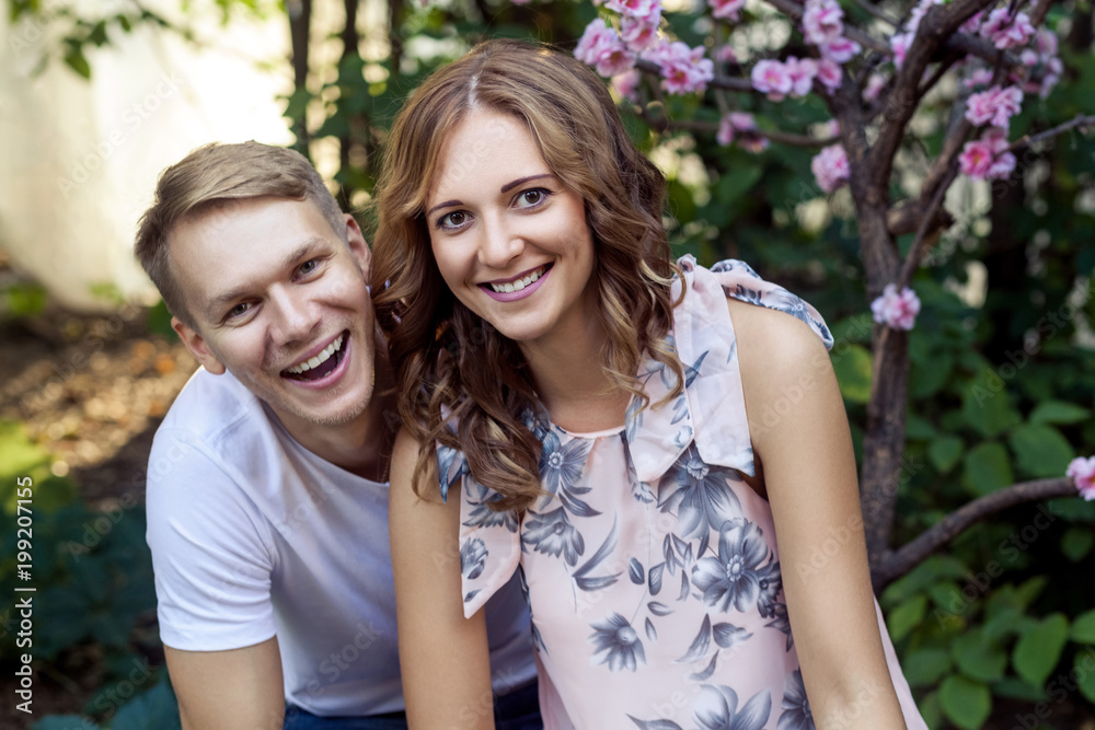 Fototapeta premium Attractive positive couple toothy smiling at camera