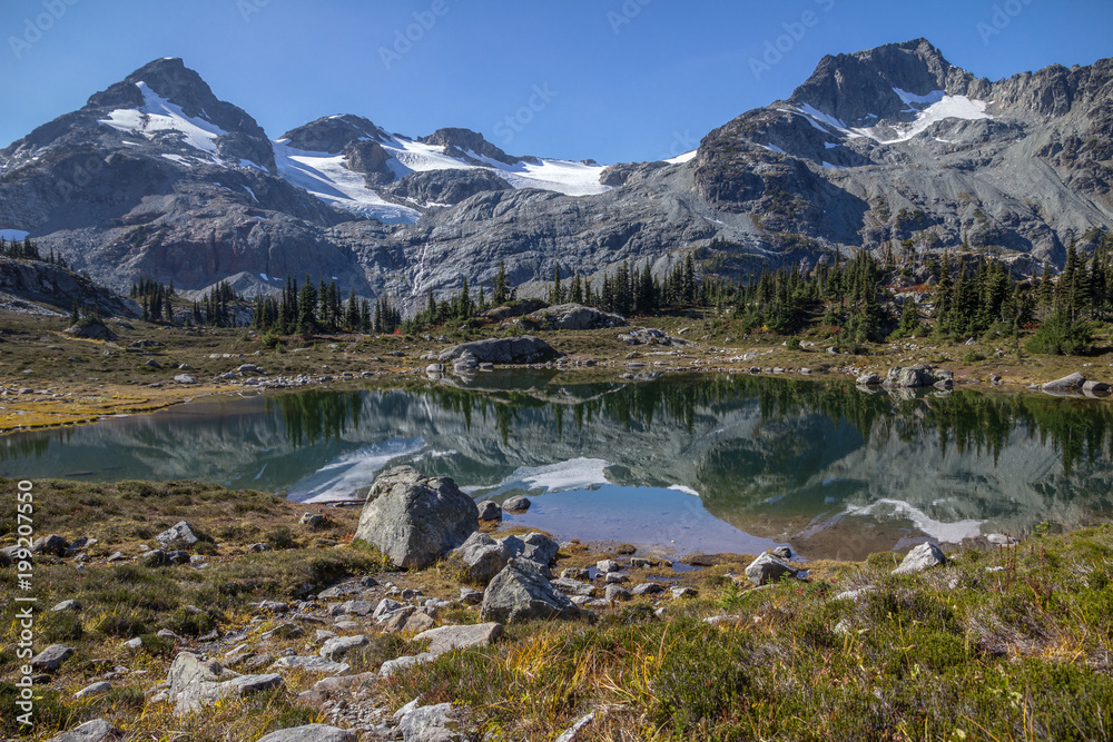Crystal clear reflections of Face Mountain in Semaphore Lake, BC. Crystal clear reflections of Face Mountain in Semaphore Lake, BC.