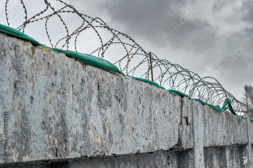 high security colony fenced with barbed wire for criminals with life imprisonment