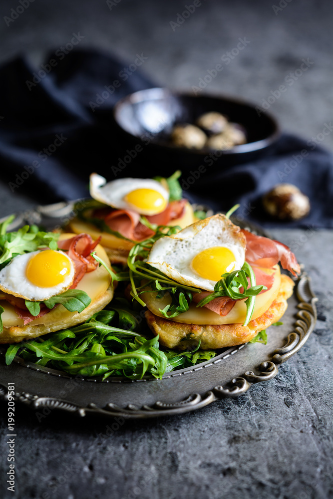 Savoury yoghurt and scallion pancakes with Black Forrest ham, smoked cheese slices, quail egg and arugula Savoury yoghurt and scallion pancakes with Black Forrest ham, smoked cheese slices, quail egg and arugula