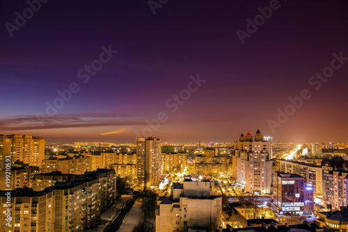 Aerial view at evening cityscape, Voronezh city downtown panorama, high-rise residential houses, business buildings, urban after dawn