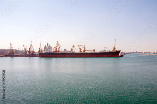 Big container ship in the dock in the port, Odessa, Ukraine.
