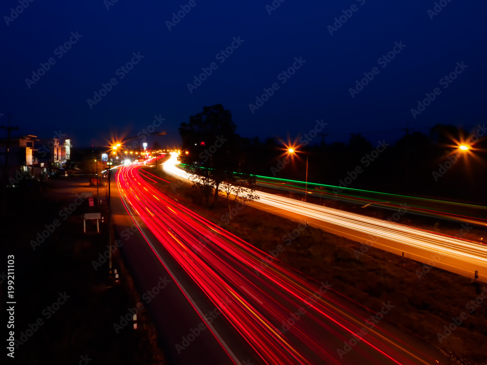 moving car with blur light through city at night moving car with blur light through city at night