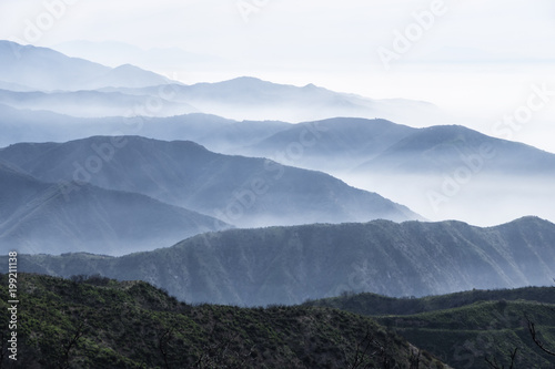 Layers of misty ridges in the San Gabriel Mountains in Los Angeles County, California