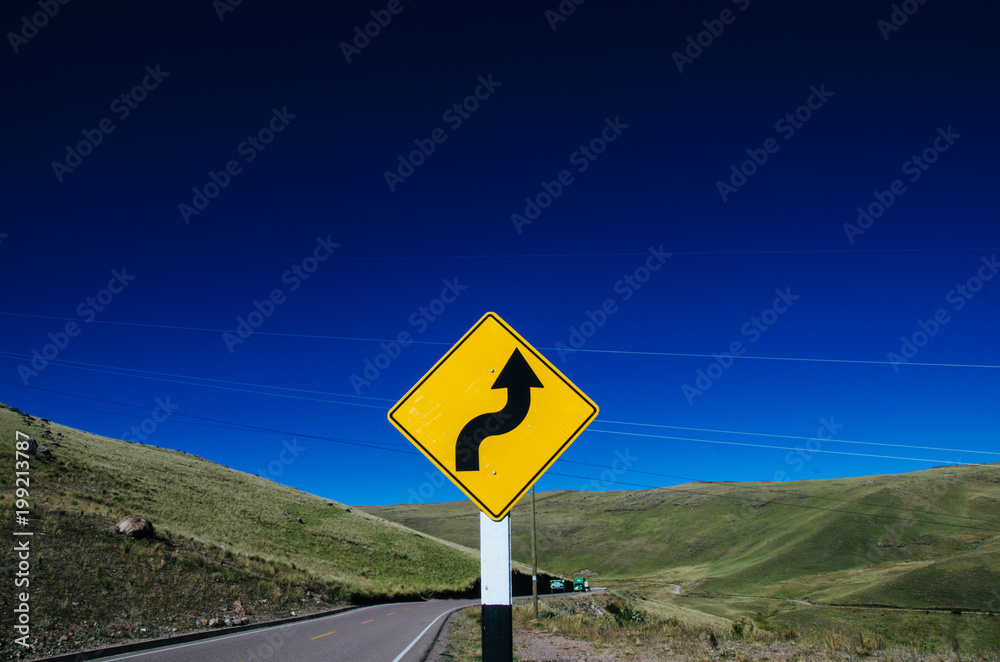 Curve sign on a highway