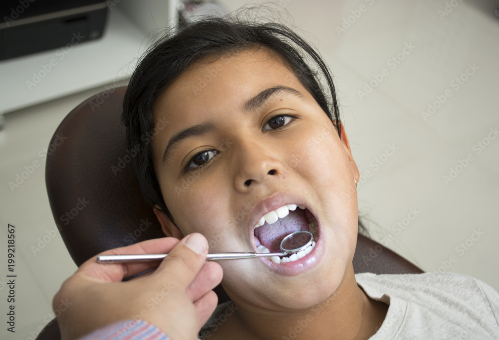 Child visits the dentist. Child visits the dentist.
