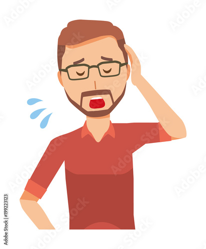 A bearded man wearing eyeglasses is tired