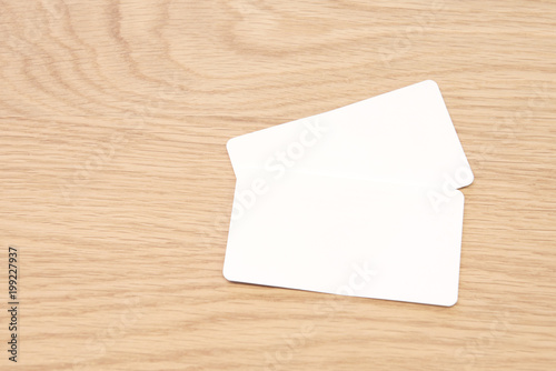 Business card on wood table.