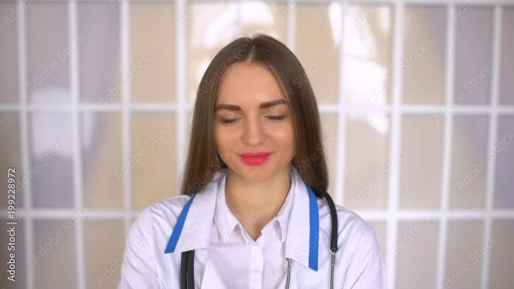 Young Medical Doctor Woman Look Camera Respond Positive Yes Answer Hospital Room. 4 k Young Medical Doctor Woman Look Camera Respond Positive Yes Answer Hospital Room. 4 k