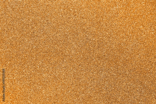 golden background in glittery material ideal as a very bright backdrop
