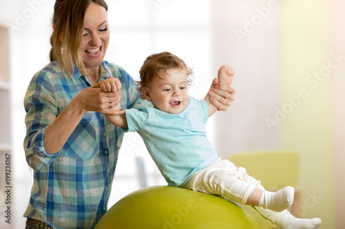 Happy mom and her baby son ...