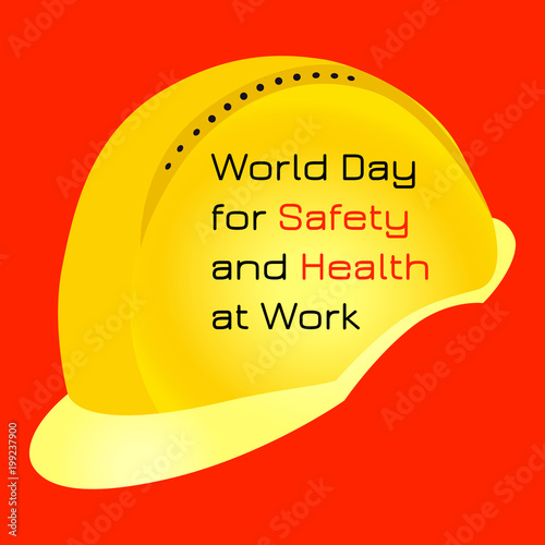 World Day for Safety and Health at Work. Yellow protective helmet. photo