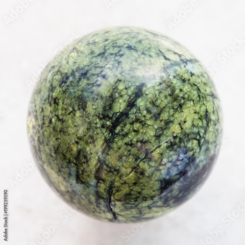 ball from Serpentine gemstone on white