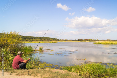Fisherman on the shore of the lake.