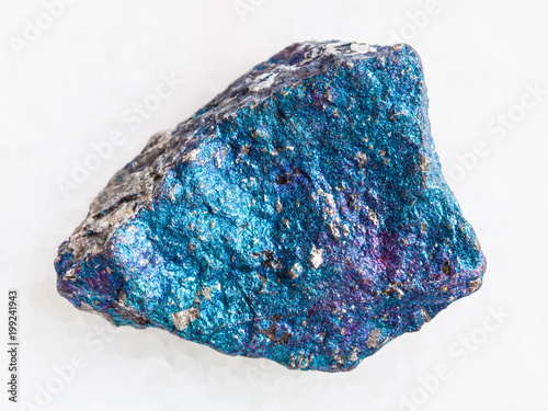 raw blue Chalcopyrite stone on white