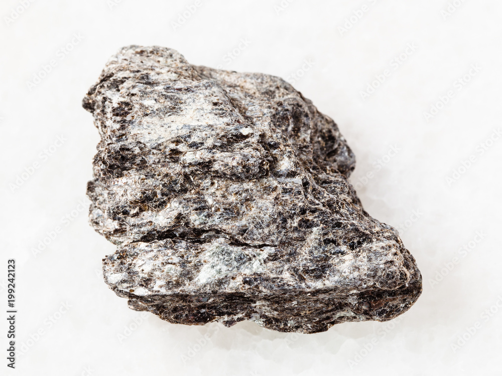 rough quartz-biotite schist stone on white rough quartz-biotite schist stone on white