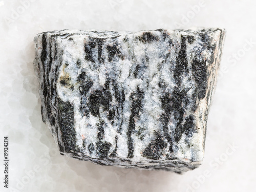 raw migmatite stone on white photo