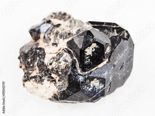 raw black crystal of Spinel gemstone on Diopside