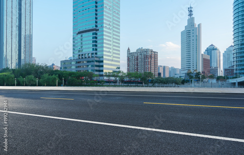 empty urban road with city skyline on background，tianjin,China,Asia.