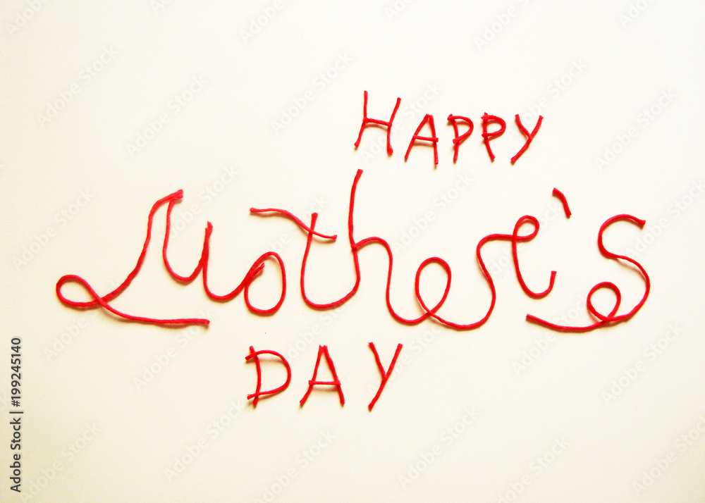 picture of the inscription Happy Mother's day made by red threads on beige background. Hand lettering. Cute text for postcard. picture of the inscription Happy Mother's day made by red threads on beige background. Hand lettering. Cute text for postcard.