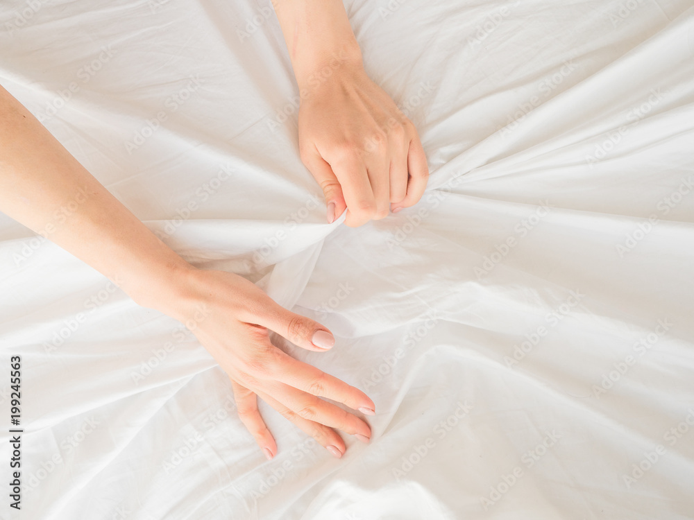 beautiful female hands lying in bed. Healthcare concept beautiful female hands lying in bed. Healthcare concept