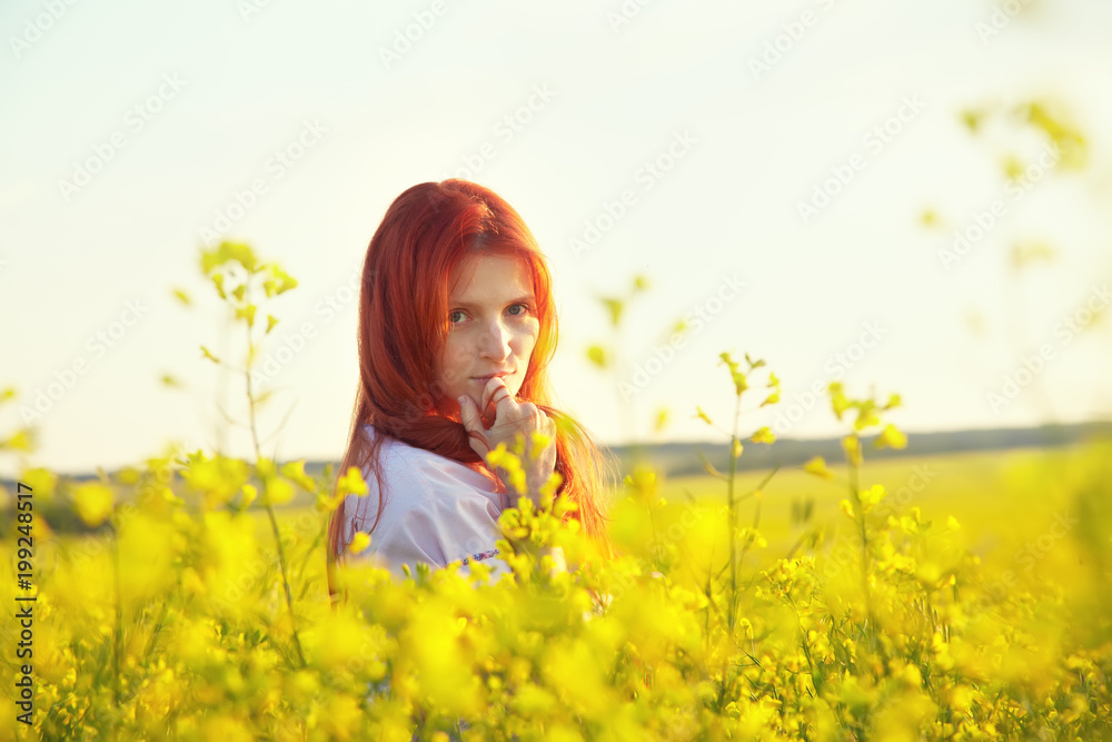 Fototapeta premium redhead woman outdoors